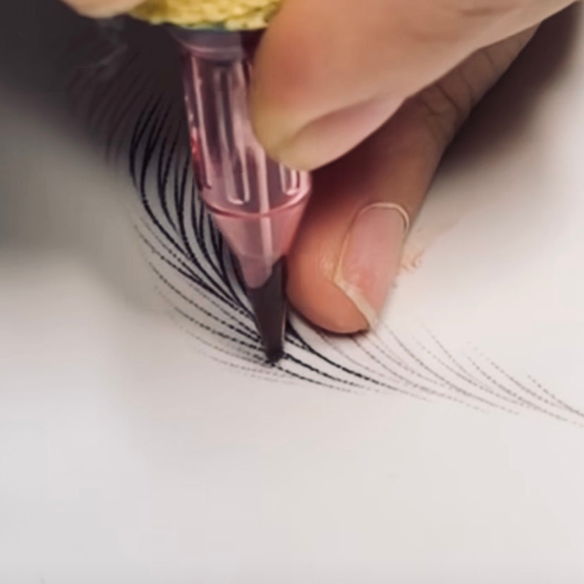 Up-close of a tattoo gun.