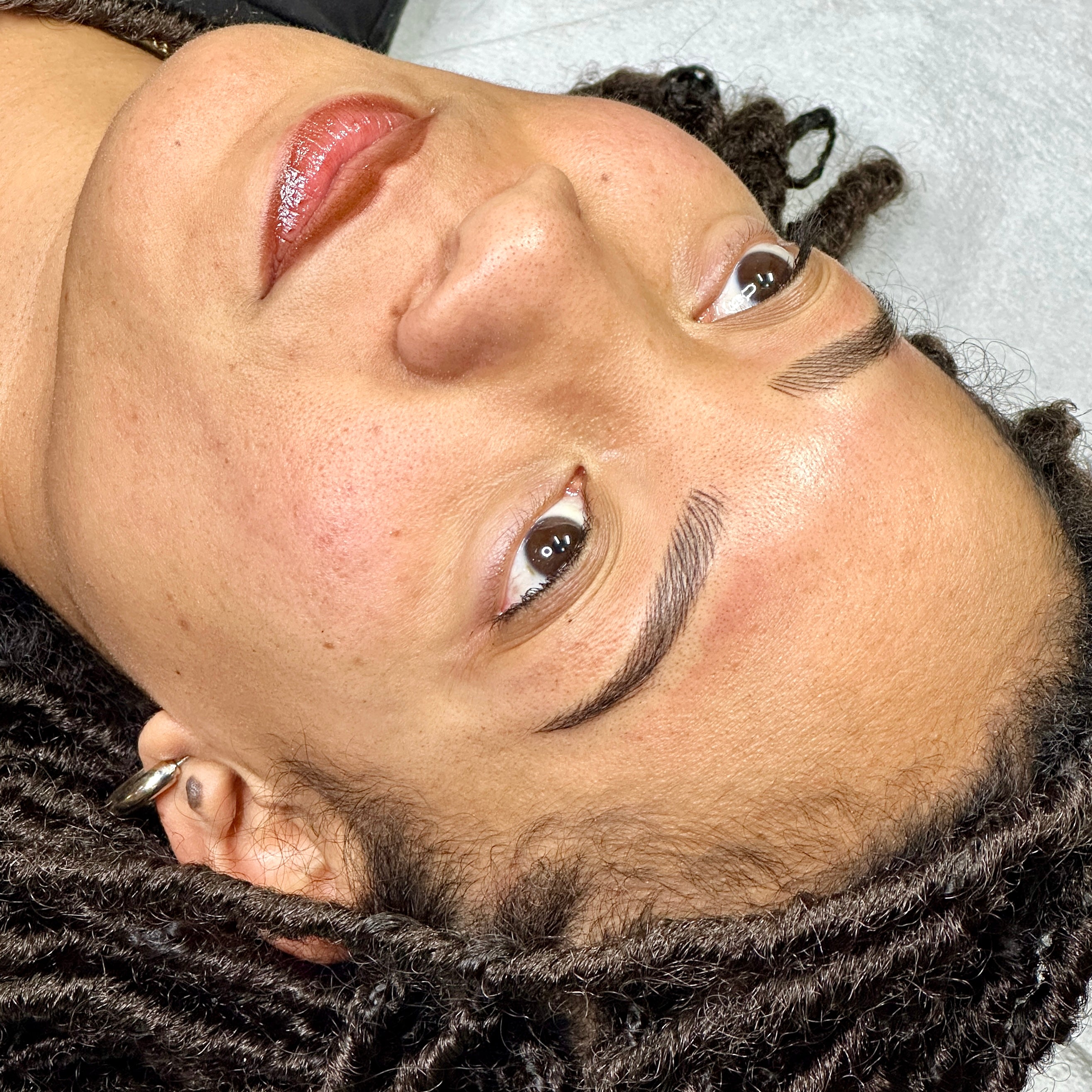 Microbladed brows on female client.
