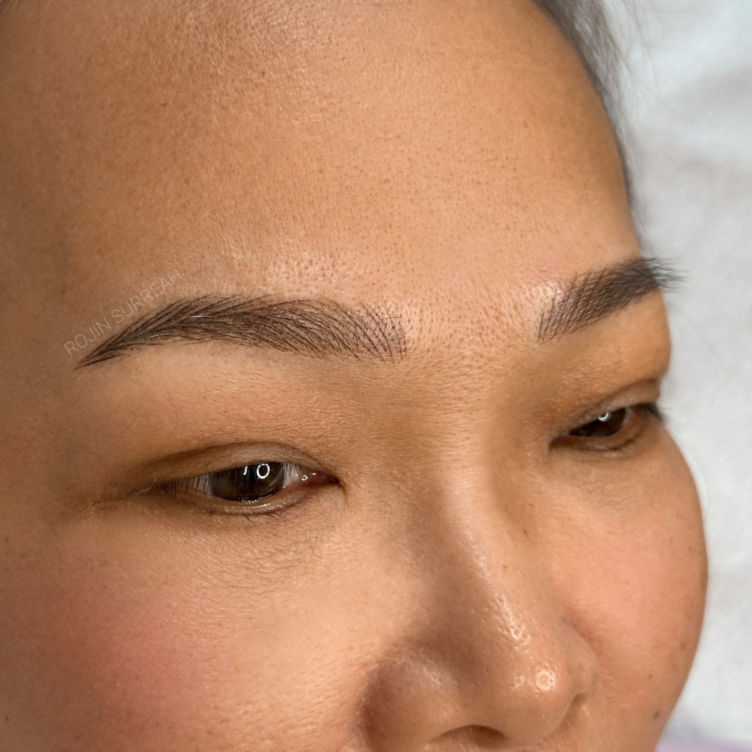 After of a female client with nano brows at Rouge Ink.